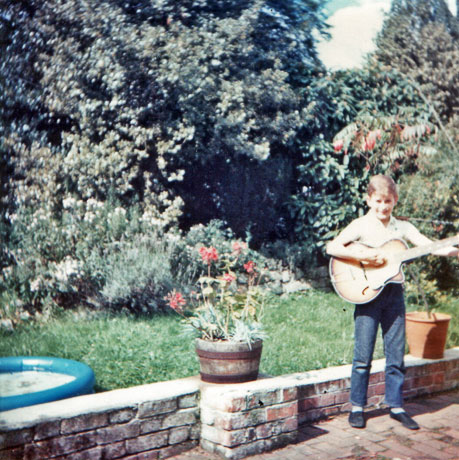 12 year old Jo with his first guitar